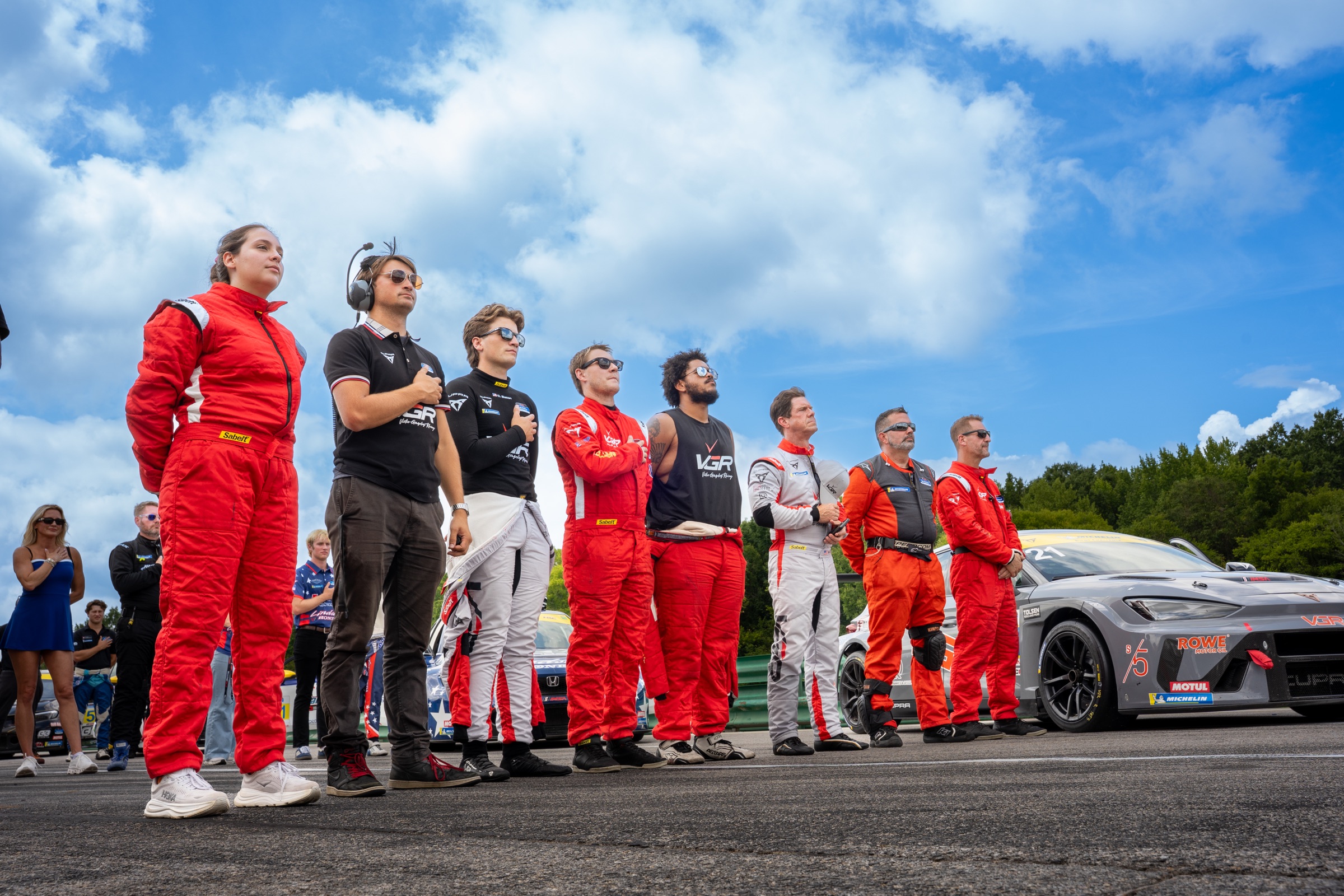 The VGR team stands with the No. 99 CUPRA at VIR