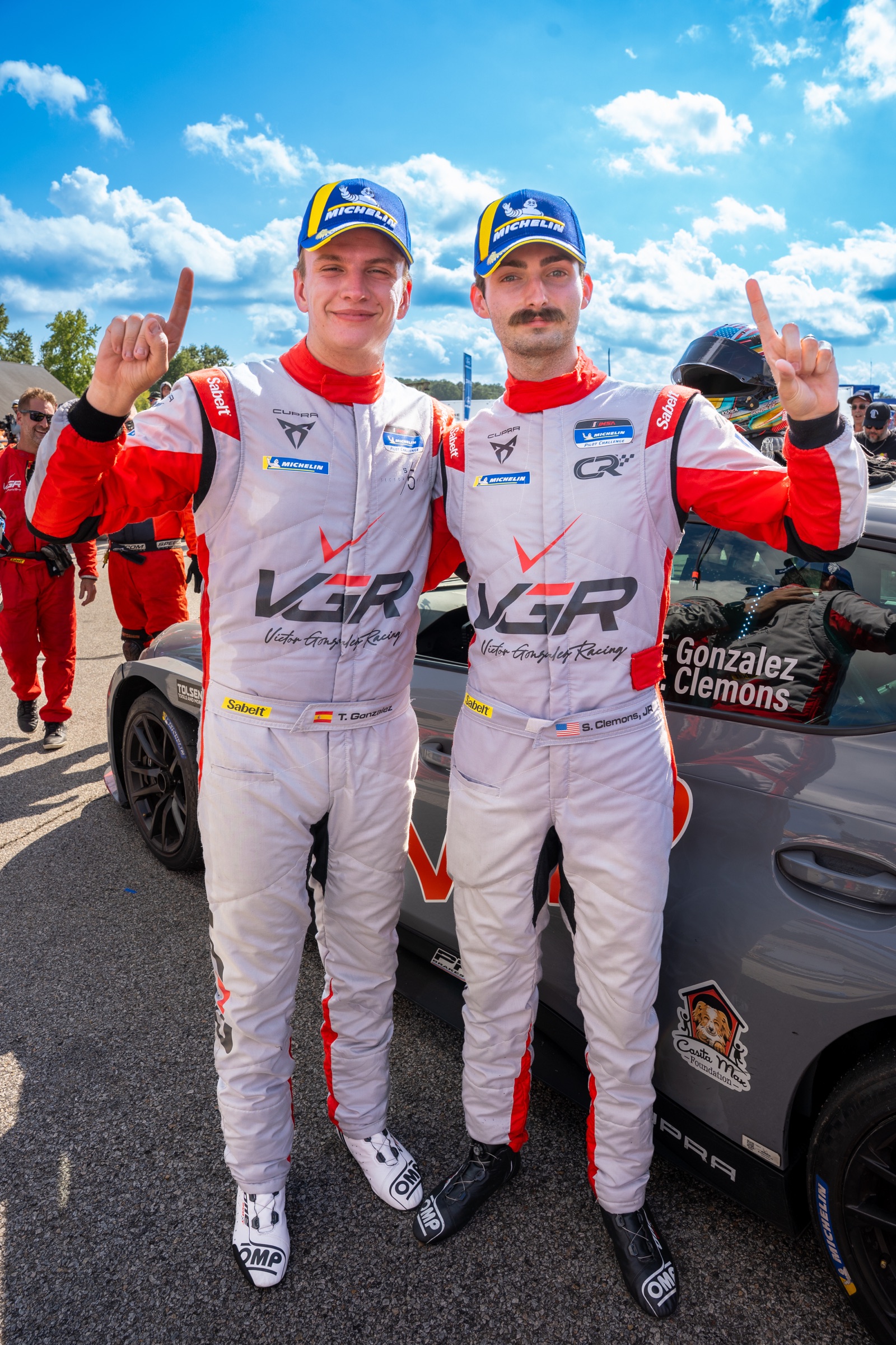 Tyler Gonzalez and Steven Clemons Jr. celebrate the No. 99 victory at VIR